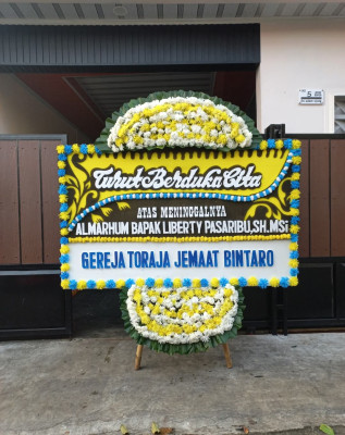 Papan Bunga Duka di Sindulang